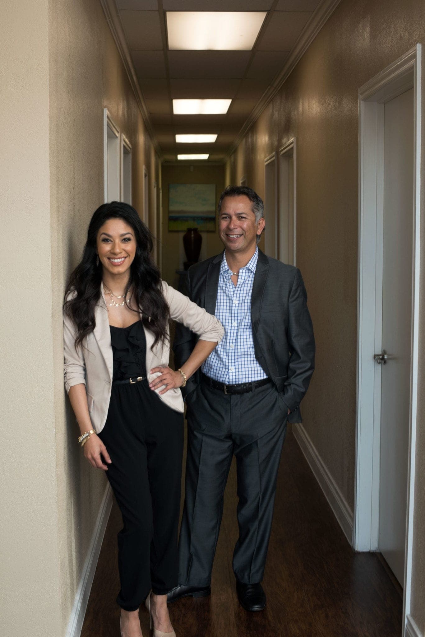 Dr Banda and a team member in the clinic hallway